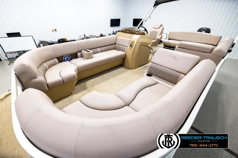 Slide: The Image of Luxurious interior of a 2018 Bennington 24 SSBXPDL pontoon boat with plush seating. - 10