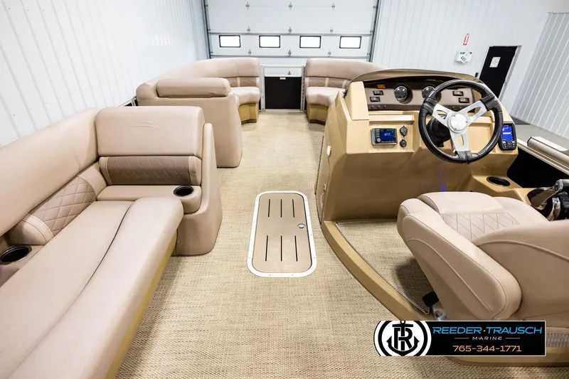 Slide: The Image of Interior of a 2018 Bennington 24 SSBXPDL pontoon boat with beige seating. - 17