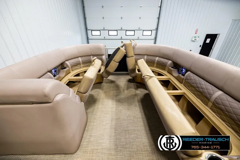Slide: The Image of Luxurious interior of 2018 Bennington 24 SSBXPDL pontoon boat with beige seating. - 20