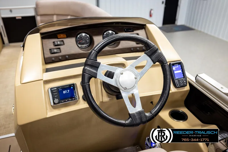 Slide: The Image of Steering console of 2018 Bennington 24 SSBXPDL boat with modern controls and gauges. - 33