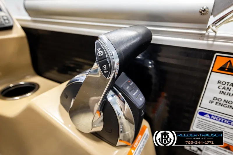 Slide: The Image of Close-up of throttle control on 2018 Bennington 24 SSBXPDL boat dashboard. - 39