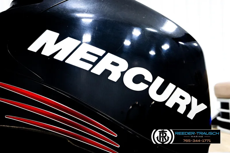 Slide: The Image of Mercury engine on 2018 Bennington 24 SSBXPDL boat, Reeder-Trausch Marine logo visible. - 48