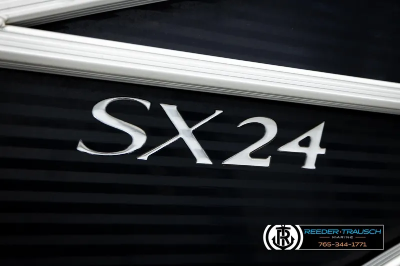 Slide: The Image of 2018 Bennington 24 SSBXPDL boat with SX24 emblem, Reeder-Trausch Marine branding. - 54