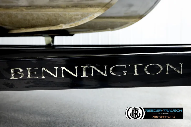 Slide: The Image of 2018 Bennington 24 SSBXPDL boat trailer with logo, Reeder-Trausch Marine branding. - 55