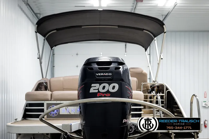 Slide: The Image of 2018 Bennington 24 SSBXPDL pontoon boat with Verado 200 Pro motor in a showroom. - 7
