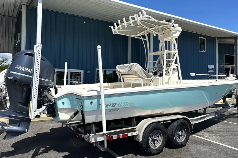 Slide: The Image of 2014 Pathfinder 2600 HPS boat on trailer with Yamaha outboard motor. - 2