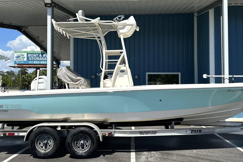 Slide: The Image of 2014 Pathfinder 2600 HPS boat on trailer under shelter, side view. - 3