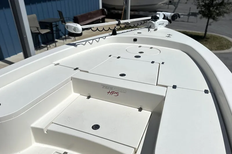 Slide: The Image of 2014 Pathfinder 2600 HPS boat deck with storage compartments and trolling motor. - 9