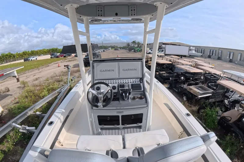 Slide: The Image of 2023 ShearWater 270 Carolina Flare boat cockpit with Garmin navigation system. - 16