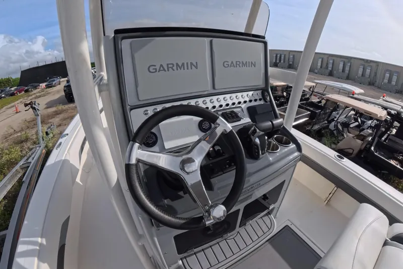 Slide: The Image of 2023 ShearWater 270 Carolina Flare boat dashboard with Garmin navigation system. - 19