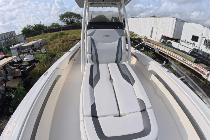 Slide: The Image of 2023 ShearWater 270 Carolina Flare boat with sleek seating and modern design. - 20