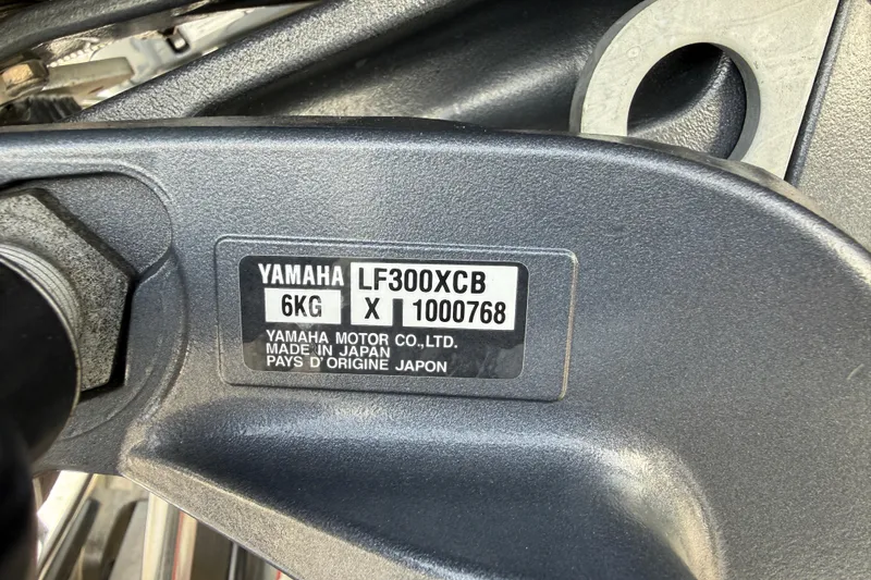 Slide: The Image of Yamaha LF300XCB engine label on 2023 ShearWater 270 Carolina Flare boat. - 27