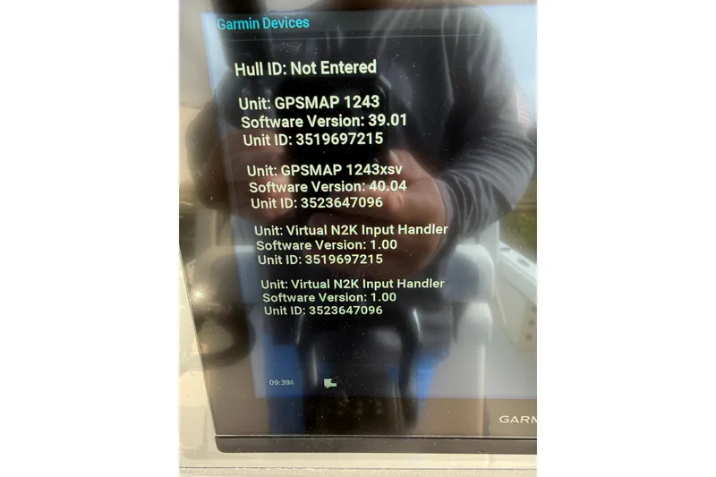 Slide: The Image of Display screen showing Garmin device information on a 2023 ShearWater 270 Carolina Flare boat. - 30