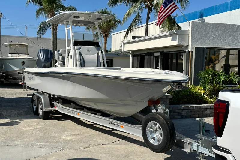 Slide: The Image of 2023 ShearWater 270 Carolina Flare boat on trailer, parked outdoors. - 4