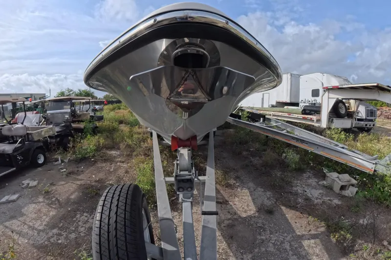 Slide: The Image of 2023 ShearWater 270 Carolina Flare boat on trailer, outdoor setting. - 5