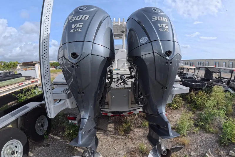 Slide: The Image of 2023 ShearWater 270 Carolina Flare with dual Yamaha 300 V6 outboard engines. - 9