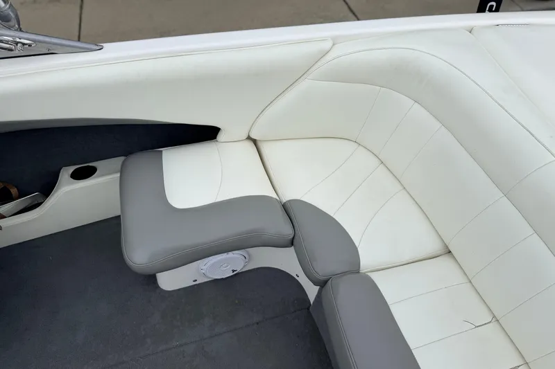 Slide: The Image of 2005 MasterCraft MariStar 230 VRS boat interior with white and gray seating. - 11