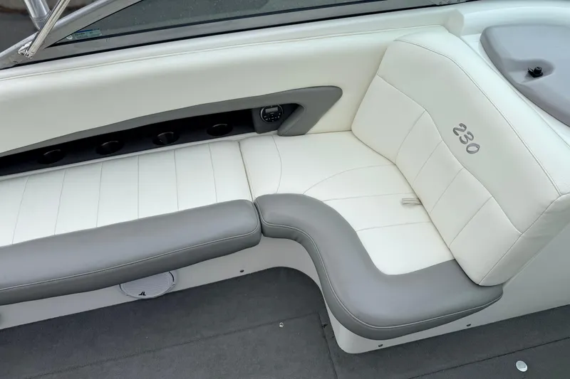 Slide: The Image of 2005 MasterCraft MariStar 230 VRS boat interior with white and gray seating. - 14