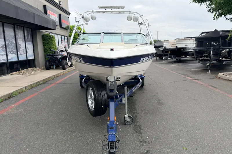 Slide: The Image of 2005 MasterCraft MariStar 230 VRS boat on trailer in dealership lot. - 2