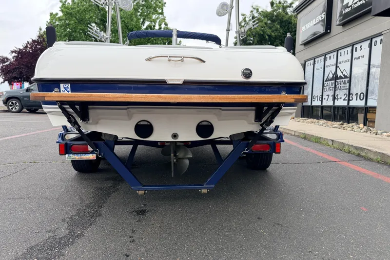 Slide: The Image of Rear view of a 2005 MasterCraft MariStar 230 VRS boat on a trailer. - 7