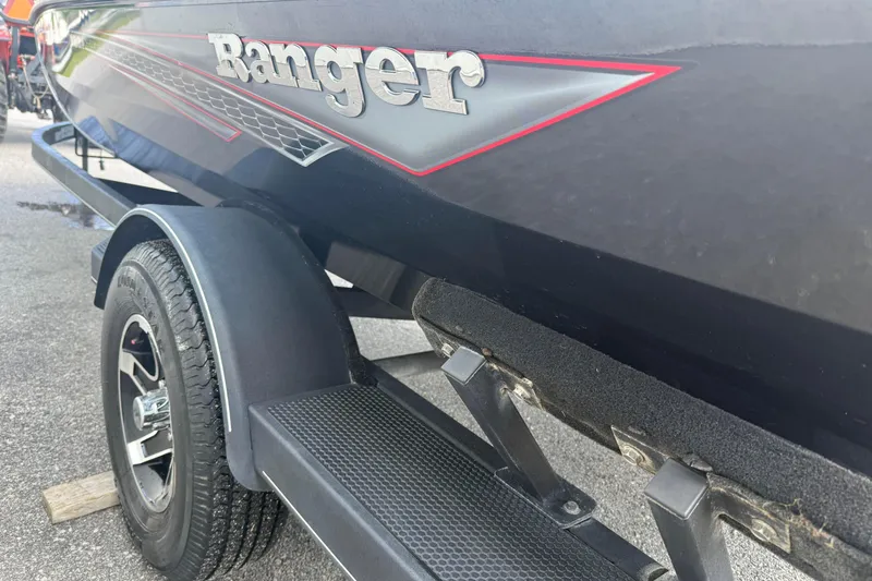 Slide: The Image of 2023 Ranger RT188P boat on trailer, showcasing sleek design and branding. - 5