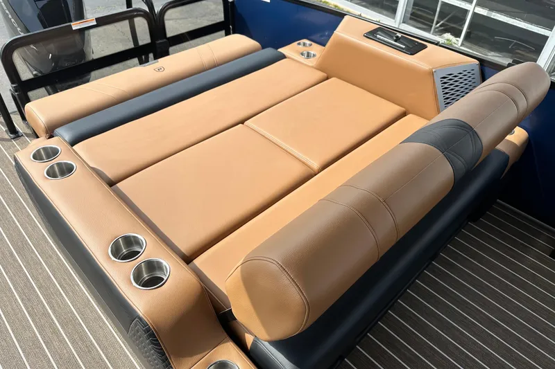 Slide: The Image of Luxurious seating on 2026 Premier 250 Intrigue RLO boat with cup holders and sleek design. - 12