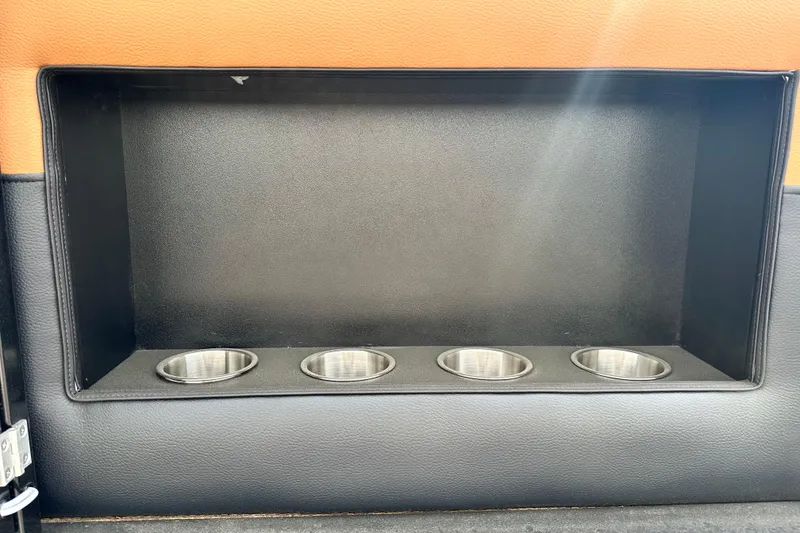 Slide: The Image of Interior of 2026 Premier 250 Intrigue RLO with four stainless steel cup holders. - 7