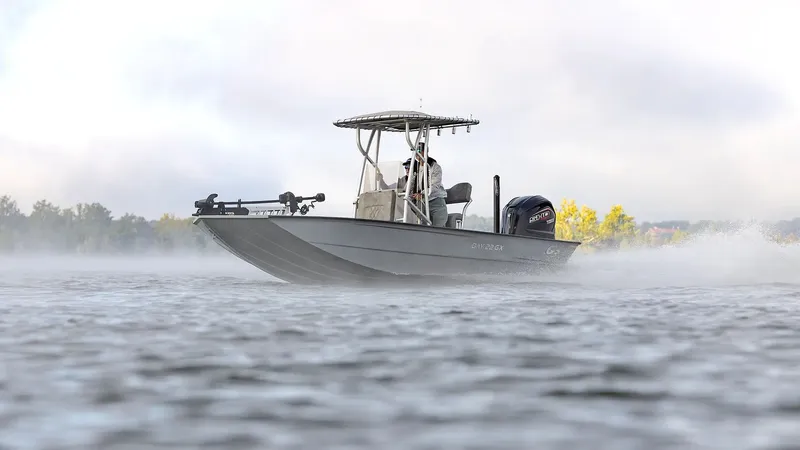 Slide: The Image of G3 Bay 22 GX boat 2026 on misty water. - 22