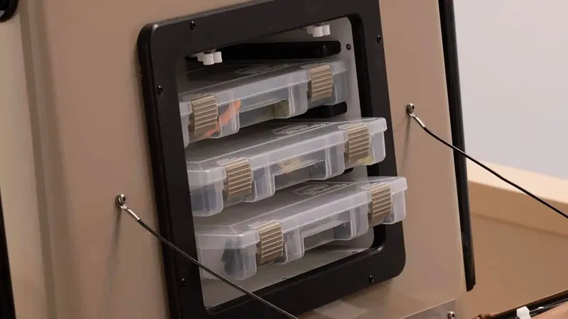 Slide: The Image of G3 Bay 21 GX 2026 with transparent storage boxes. - 21
