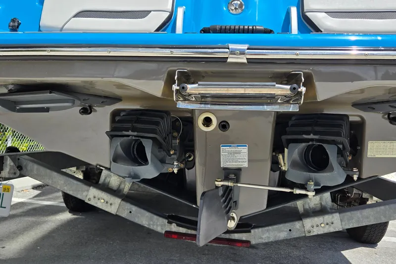 Slide: The Image of Rear view of a 2022 Yamaha Boats 255XD, showcasing dual jet propulsion system. - 11