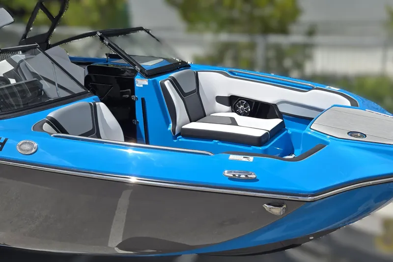 Slide: The Image of 2022 Yamaha Boats 255XD, sleek blue design, luxurious seating, modern features. - 16