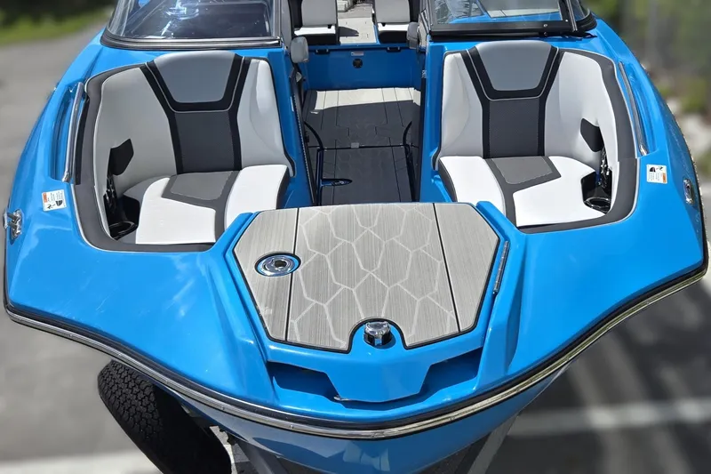 Slide: The Image of 2022 Yamaha Boats 255XD, blue exterior, spacious seating, modern design. - 17