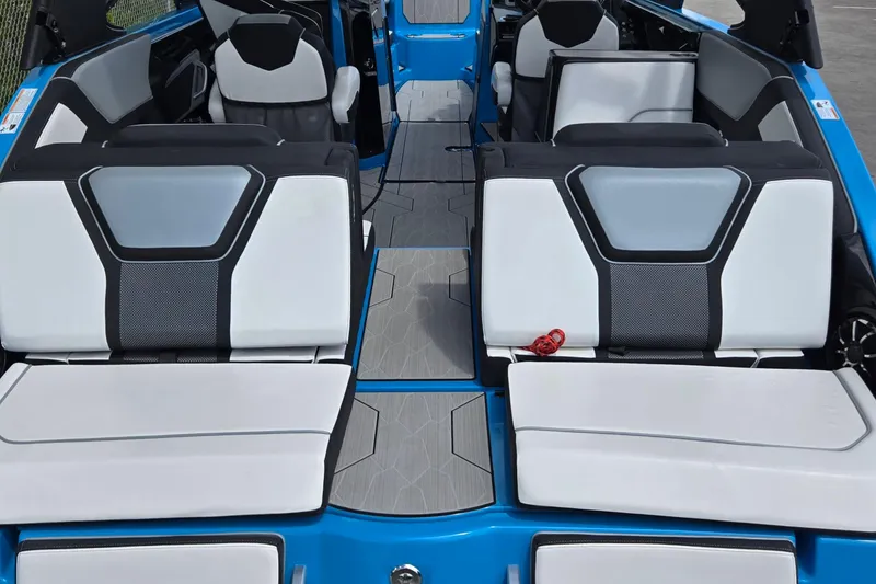 Slide: The Image of Interior of 2022 Yamaha Boats 255XD, featuring sleek seating and modern design. - 22
