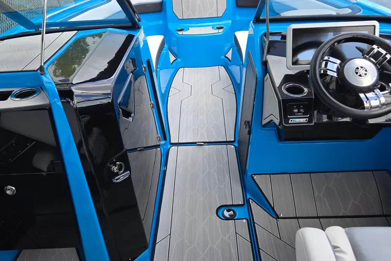 Slide: The Image of 2022 Yamaha Boats 255XD interior with sleek design and modern dashboard features. - 25