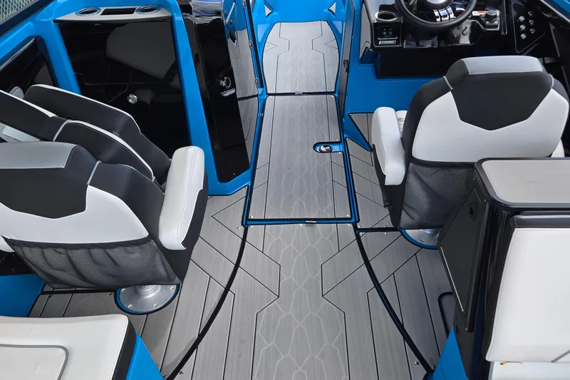 Slide: The Image of Interior of 2022 Yamaha Boats 255XD, featuring sleek seating and modern design elements. - 27