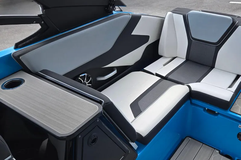Slide: The Image of 2022 Yamaha Boats 255XD interior with sleek seating and modern design. - 28