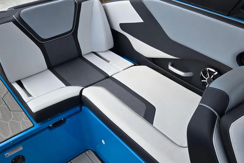 Slide: The Image of 2022 Yamaha Boats 255XD interior seating with modern design and speaker detail. - 29