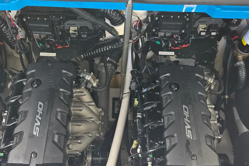 Slide: The Image of Twin Yamaha SVHO engines in a 2022 Yamaha Boats 255XD model. - 34