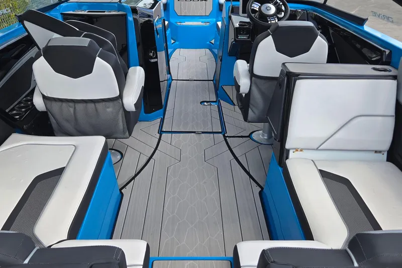 Slide: The Image of 2022 Yamaha Boats 255XD interior with modern seating and sleek design. - 4