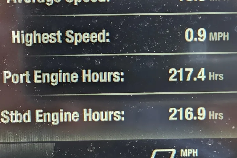 Slide: The Image of Dashboard display of 2022 Yamaha Boats 255XD engine hours and speed metrics. - 5