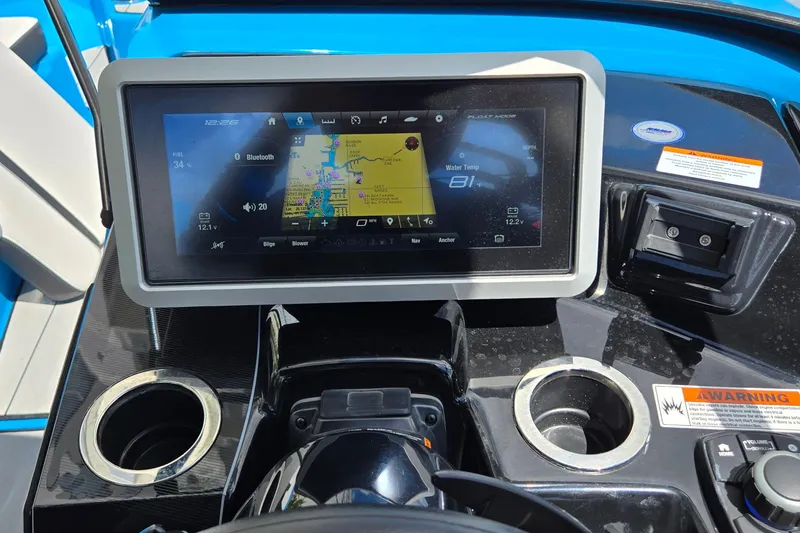Slide: The Image of Dashboard of 2022 Yamaha Boats 255XD with touchscreen navigation and controls. - 6