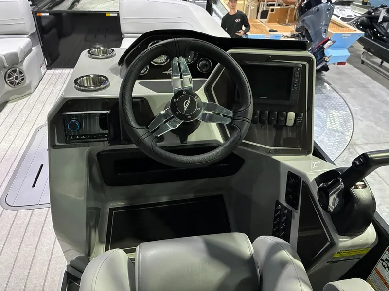 Slide: The Image of Cockpit of SunCatcher Fusion 324SL boat, model year 2026. - 11