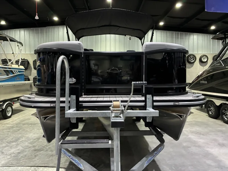 Slide: The Image of 2026 SunCatcher Fusion 324SL pontoon boat in showroom. - 6