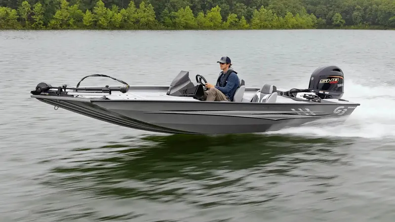 Slide: The Image of 2026 G3 Sportsman 1710 SE boat on a lake. - 26