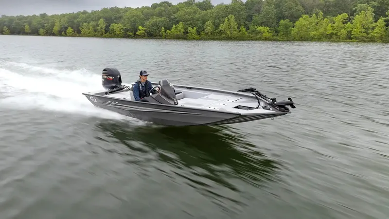 Slide: The Image of 2026 G3 Sportsman 1710 SE boat on a lake. - 28