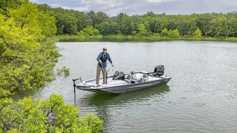Slide: The Image of Angler on G3 Sportsman 1710 SE boat on calm lake, 2026 model. - 29