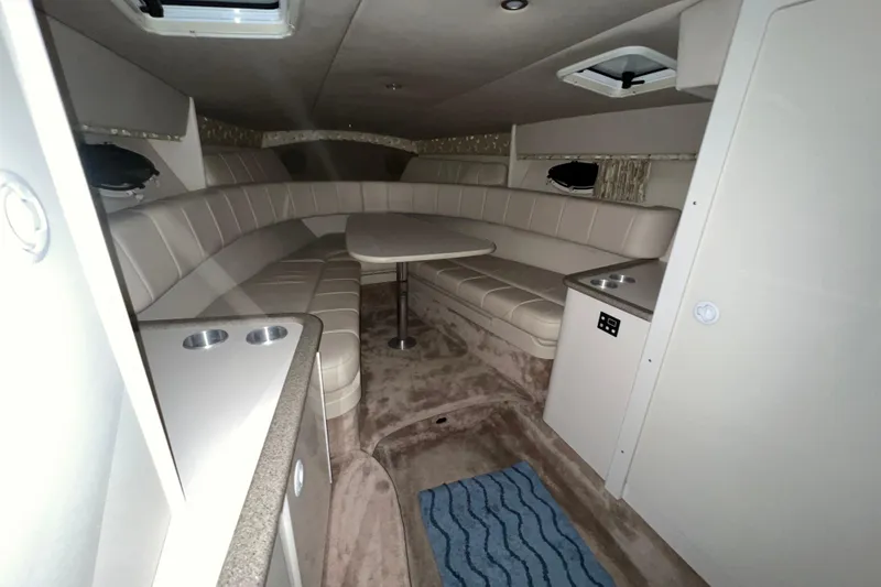 Slide: The Image of 1999 Formula 330 Sun Sport dashboard with Garmin display and speedometer. - 15