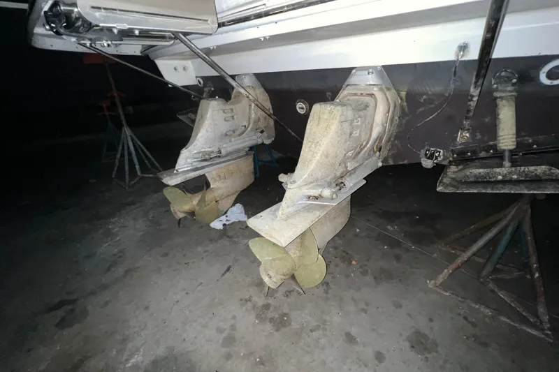 Slide: The Image of Engine compartment of a 1999 Formula 330 Sun Sport boat, showcasing wiring and components. - 23