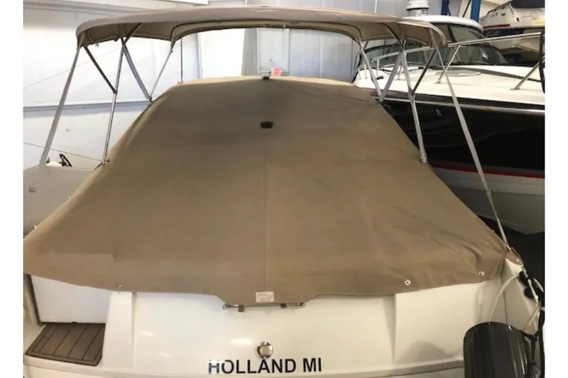 Slide: The Image of 1999 Formula 330 Sun Sport boat with cover, docked in Holland, MI. - 28