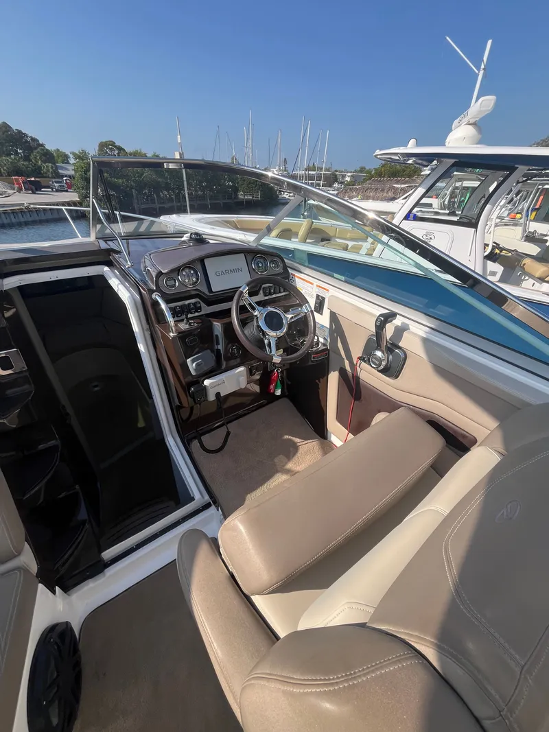 Slide: The Image of Interior view of a 2015 Regal 28 Express boat. - 25